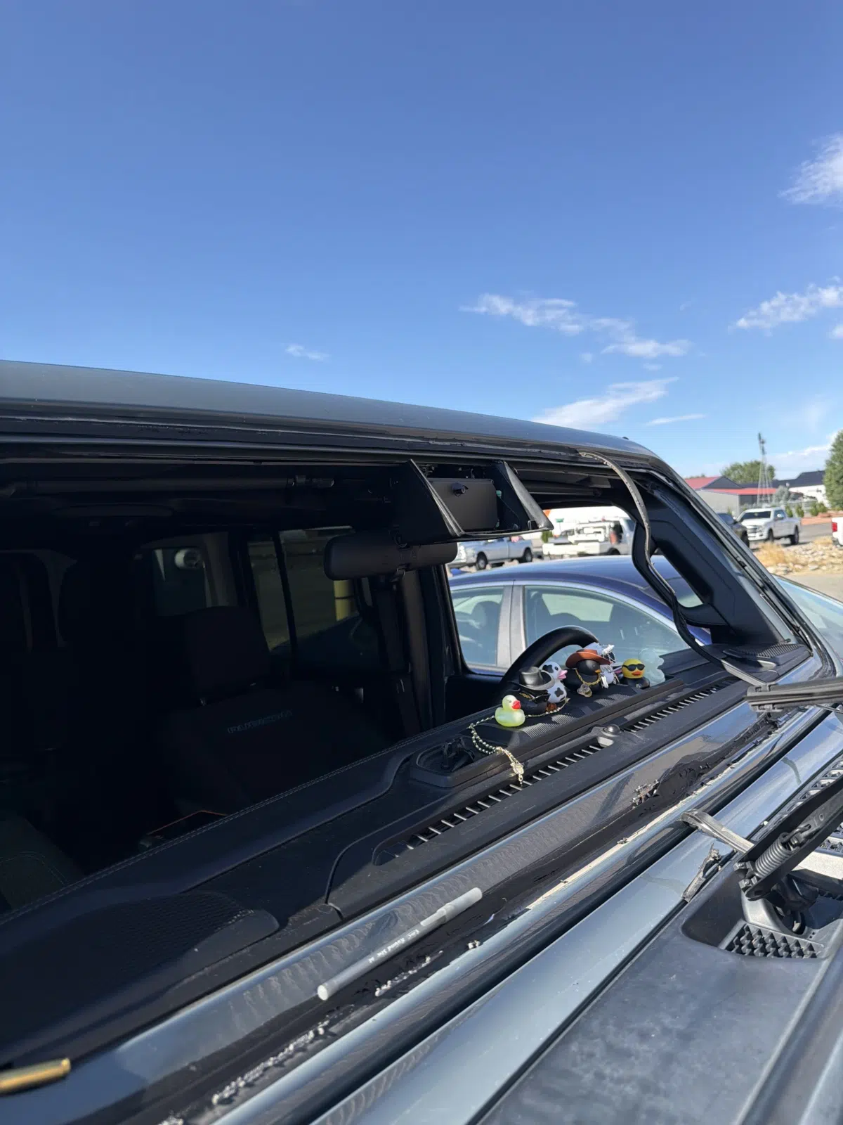 Jeep windshield removed with bare frame and dash exposed — A+ Glass LLC in Billings